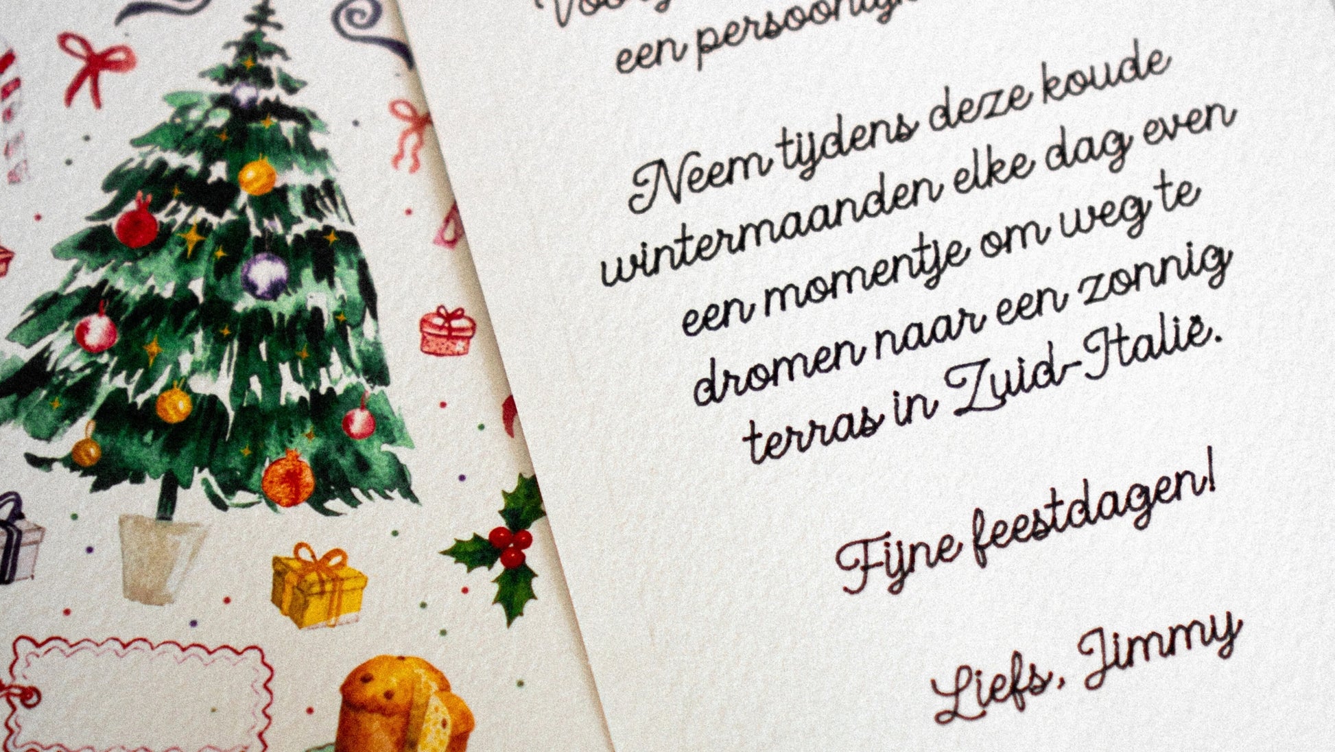 Kerst wenskarrt om cadeau te geven van Battito met kerstboom en decoratie en handgeschreven bericht